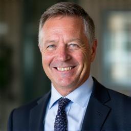 Portrait of Arthur Pendelton, a distinguished Chief Executive Officer, looking confident and well-dressed.